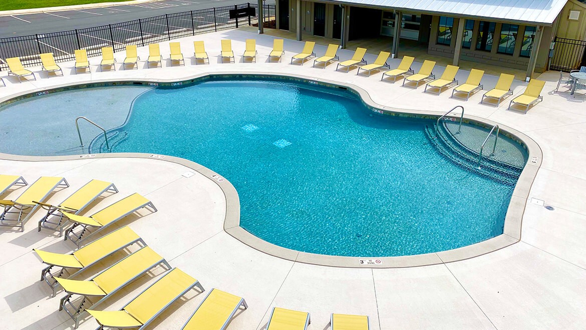 Our beautiful pool has a large max capacity plenty of lounge chairs.